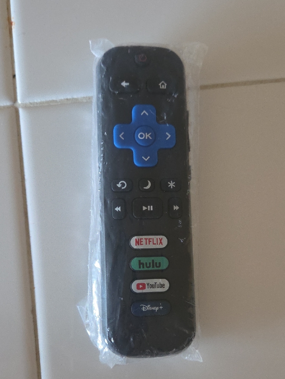 Roku Black Remote with Blue Navigation Pad and Branded App Buttons